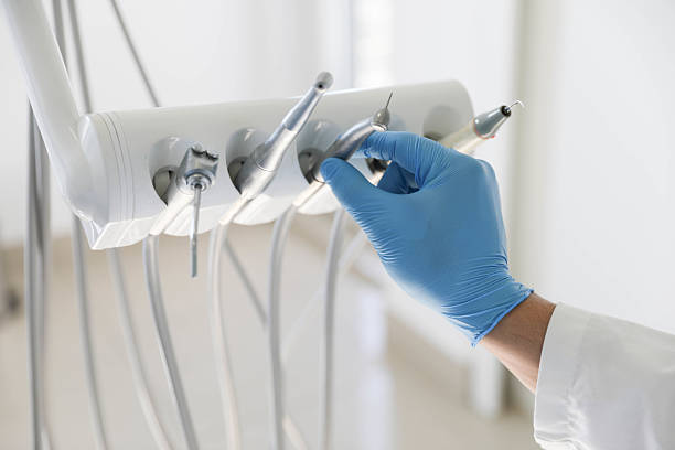 Professional Tooth Extraction technician working in Inverness, IL